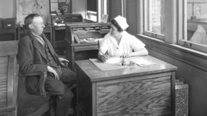 Nurse with patient in City Hospital Tuberculosis Division, 1927