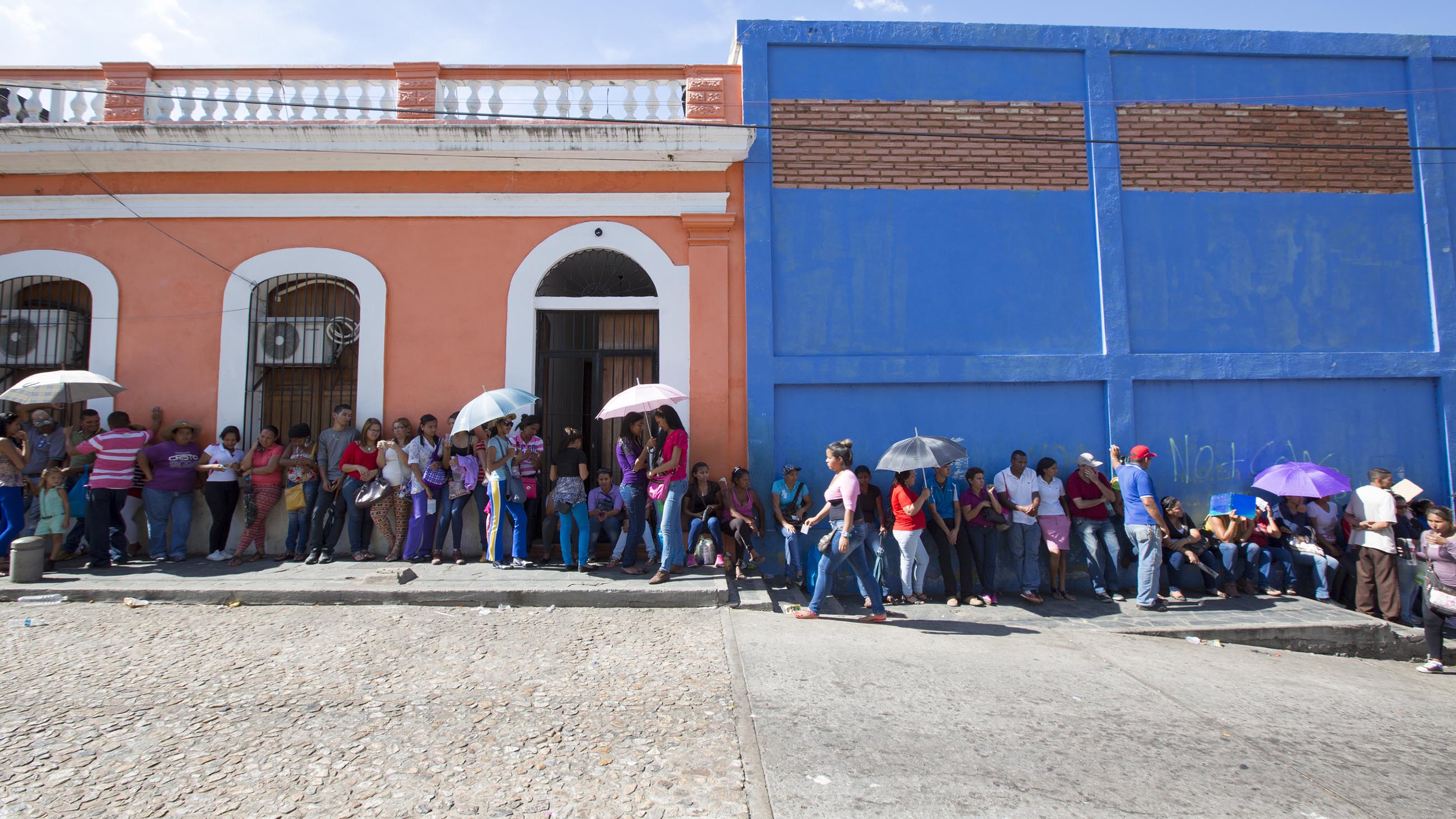 As Zika takes hold, Venezuelans are facing long lines and shortages for everything from groceries to medications. Pfizer has stepped in, but much more is needed.