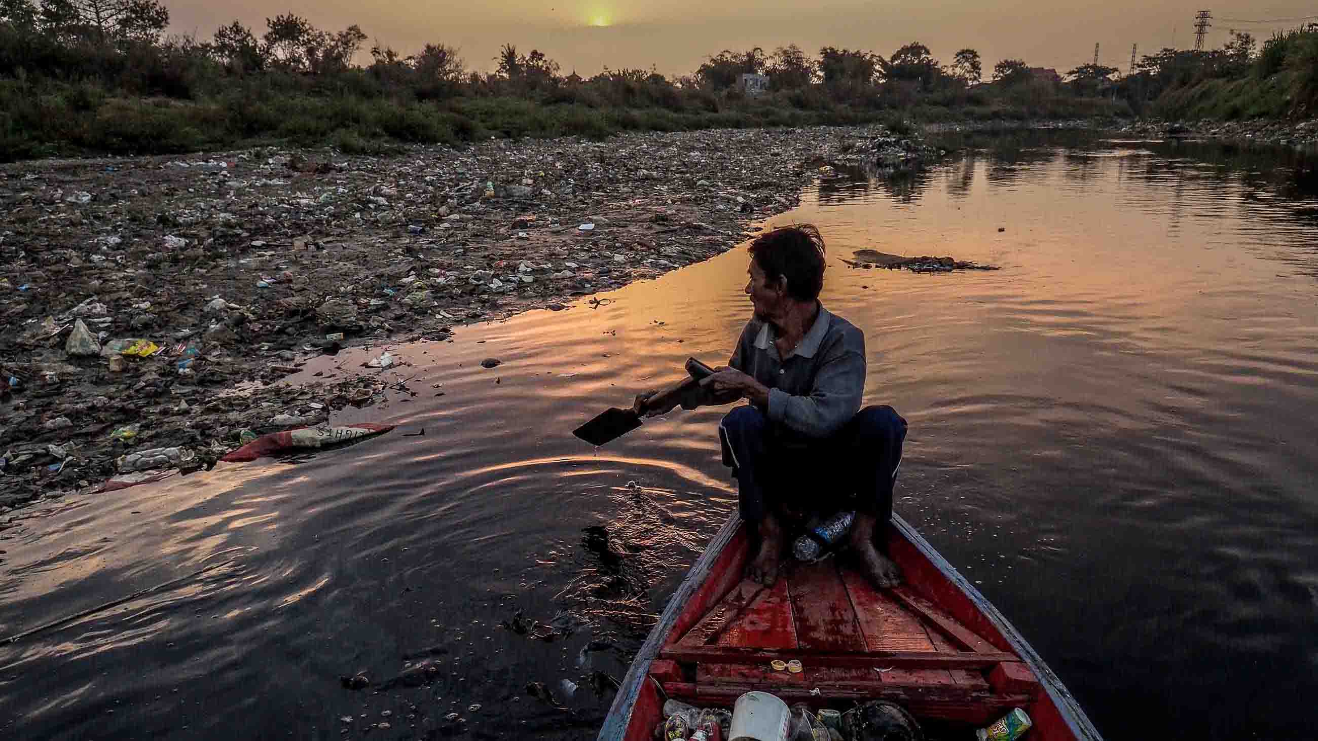 Dedi Rahman, 65, remembers swimming in the Citarum River when he was a boy. Today, the river is considered one of the world's most polluted waterways, contaminated by factory effluent, sewage and trash. Rahman gathers cans and bottles to recycle for cash.
