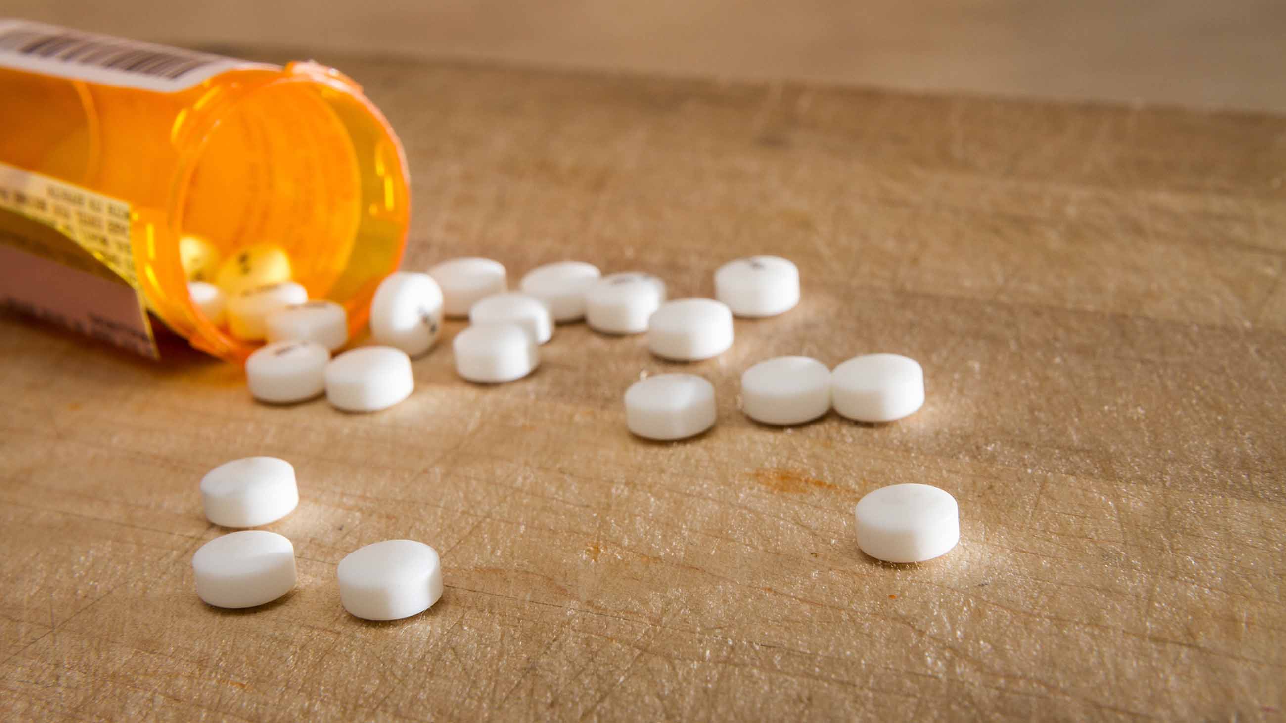Can stricter prescription drug policies address rising pain levels?