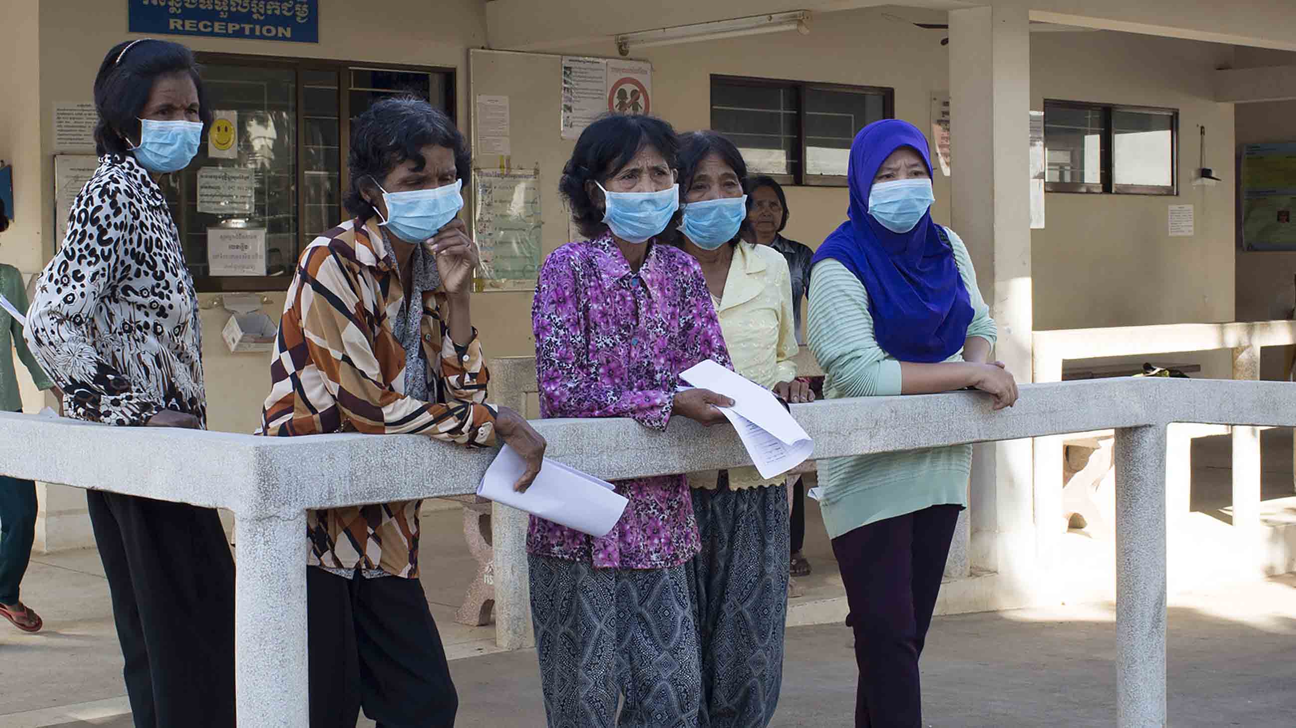 While we may think of drug resistance as a new emergency, at its heart lies an age-old disease: tuberculosis. TB patients wait outside Kampong Cham District Hospital in Cambodia.