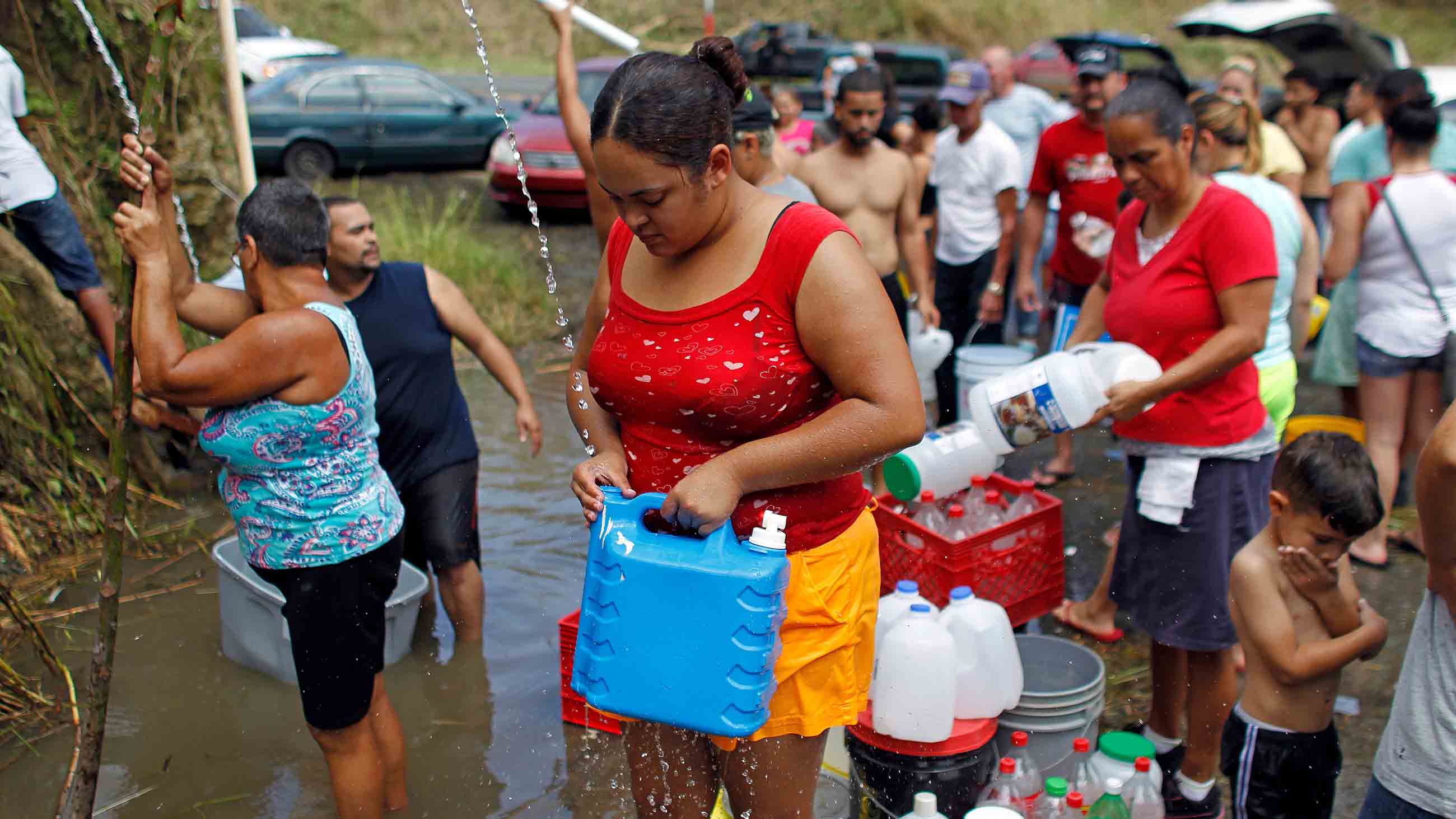 Residents across Puerto Rico are turning to natural springs, rivers, and even contaminated wells for water.