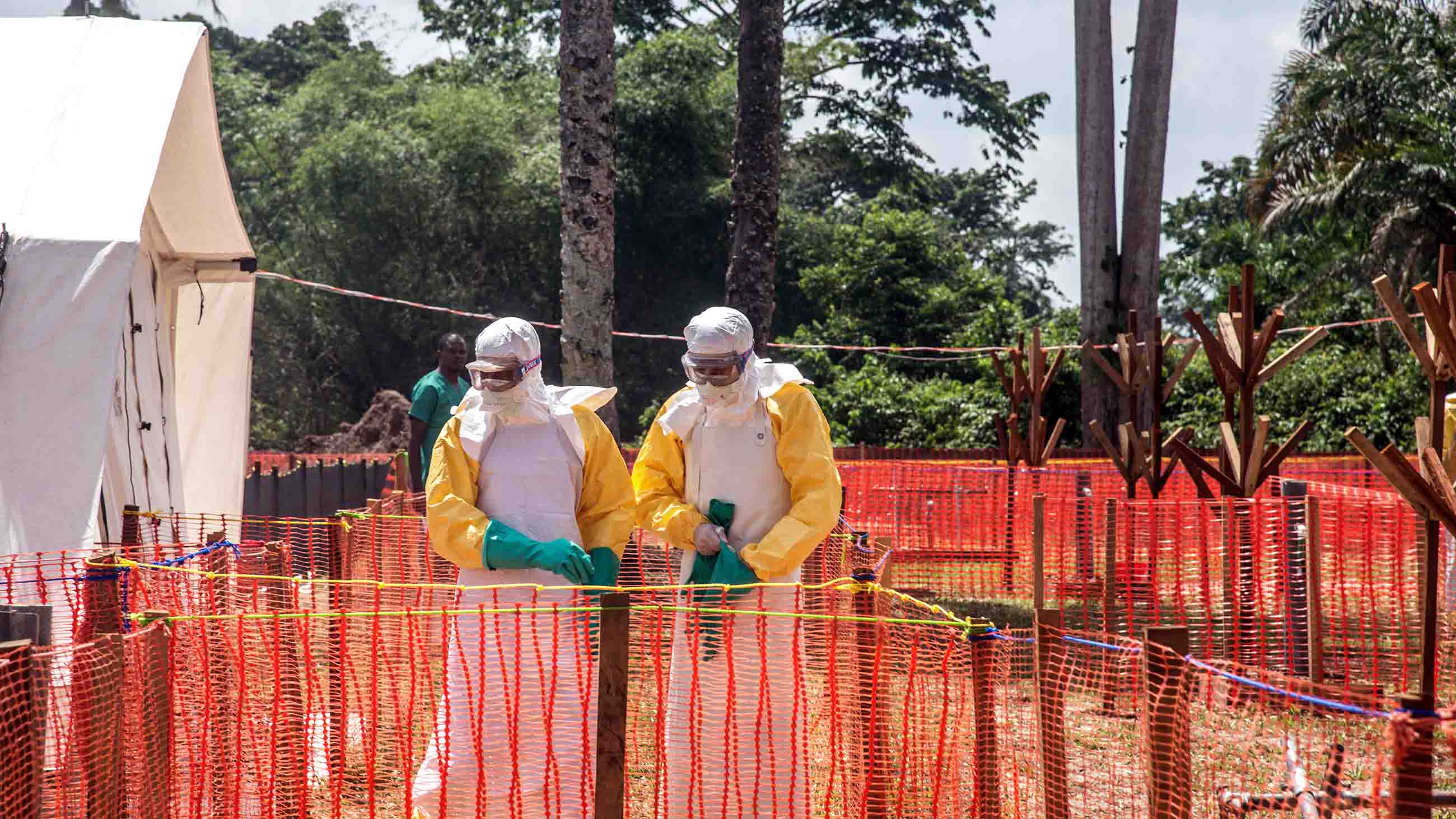 Health workers operate within an Ebola safety zone in the Health Center in Iyonda, near Mbandaka, on June 1, 2018.