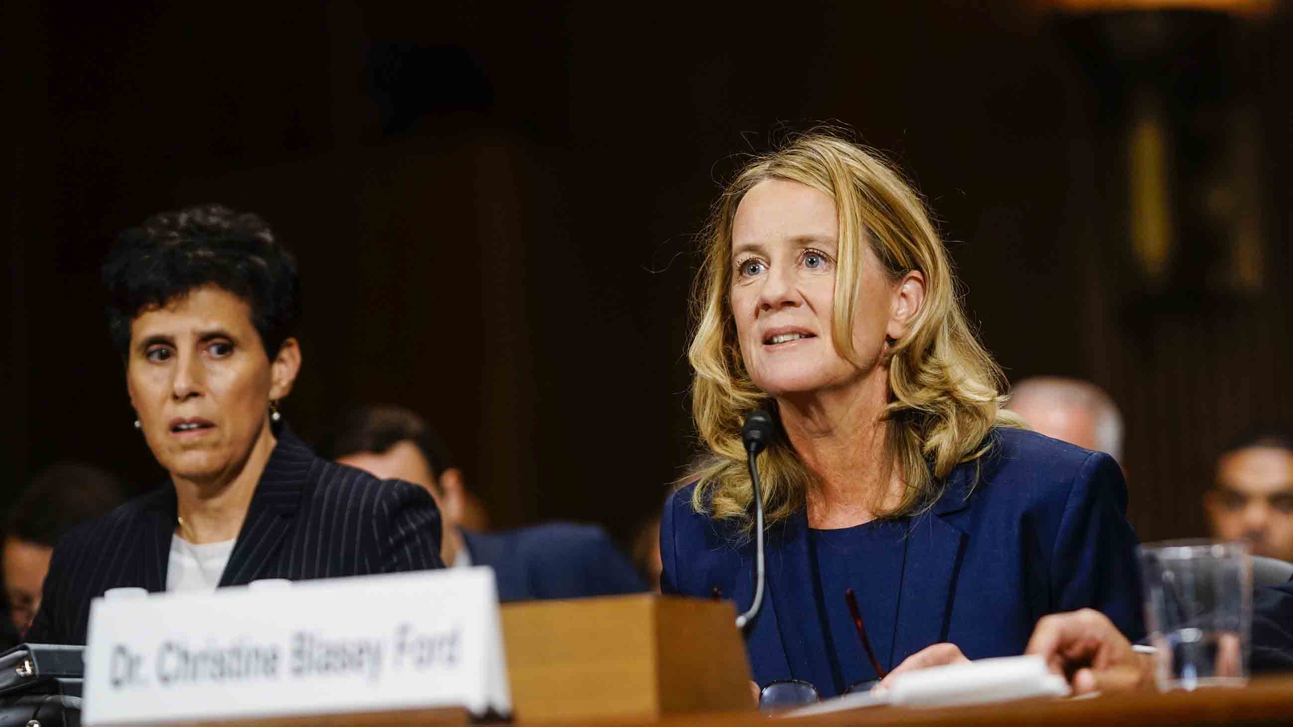Christine Blasey Ford, with lawyer Debra S. Katz, left, answers questions at a Senate Judiciary Committee hearing on Thursday, September 27, 2018 on Capitol Hill.