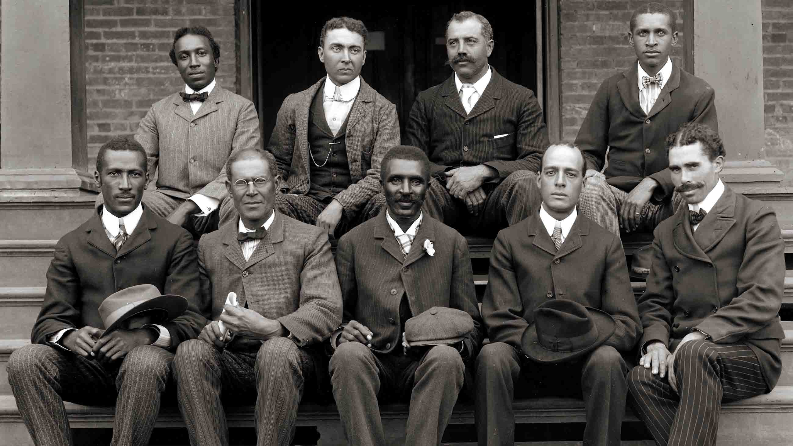 George Washington Carver, seated in the middle of the front row alongside colleagues from the Tuskegee Institute, is remembered mainly for his inventions of peanut products. But his true legacy is more complex.