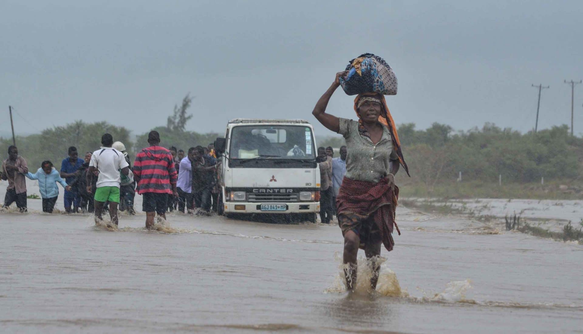 Residents brave the floods in Mazive, southern Mozambique, on April 28, 2019, days after Cyclone Kenneth made landfall in the region.