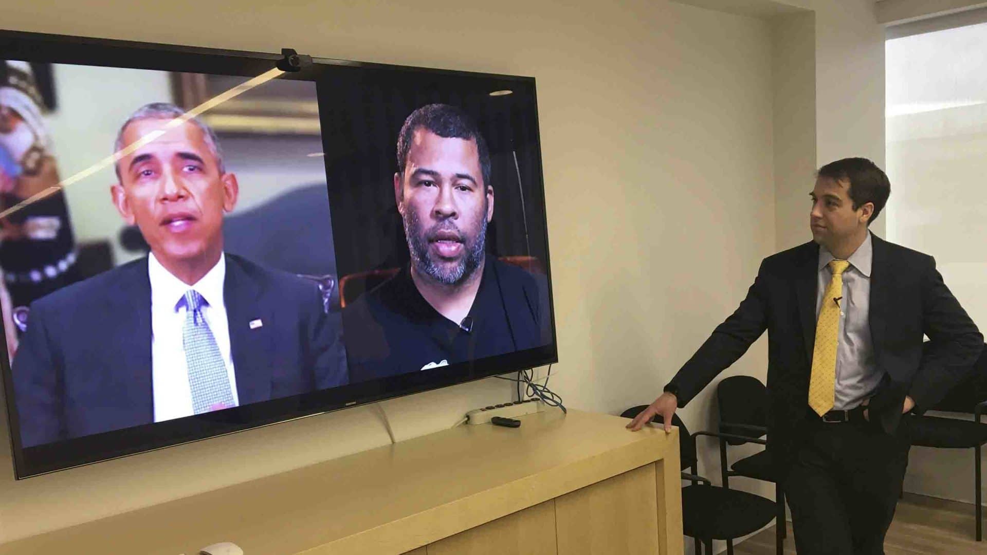 Paul Scharre of the Center for a New American Security views a deepfake video of filmmaker Jordan Peele giving a speech as former president Barack Obama.