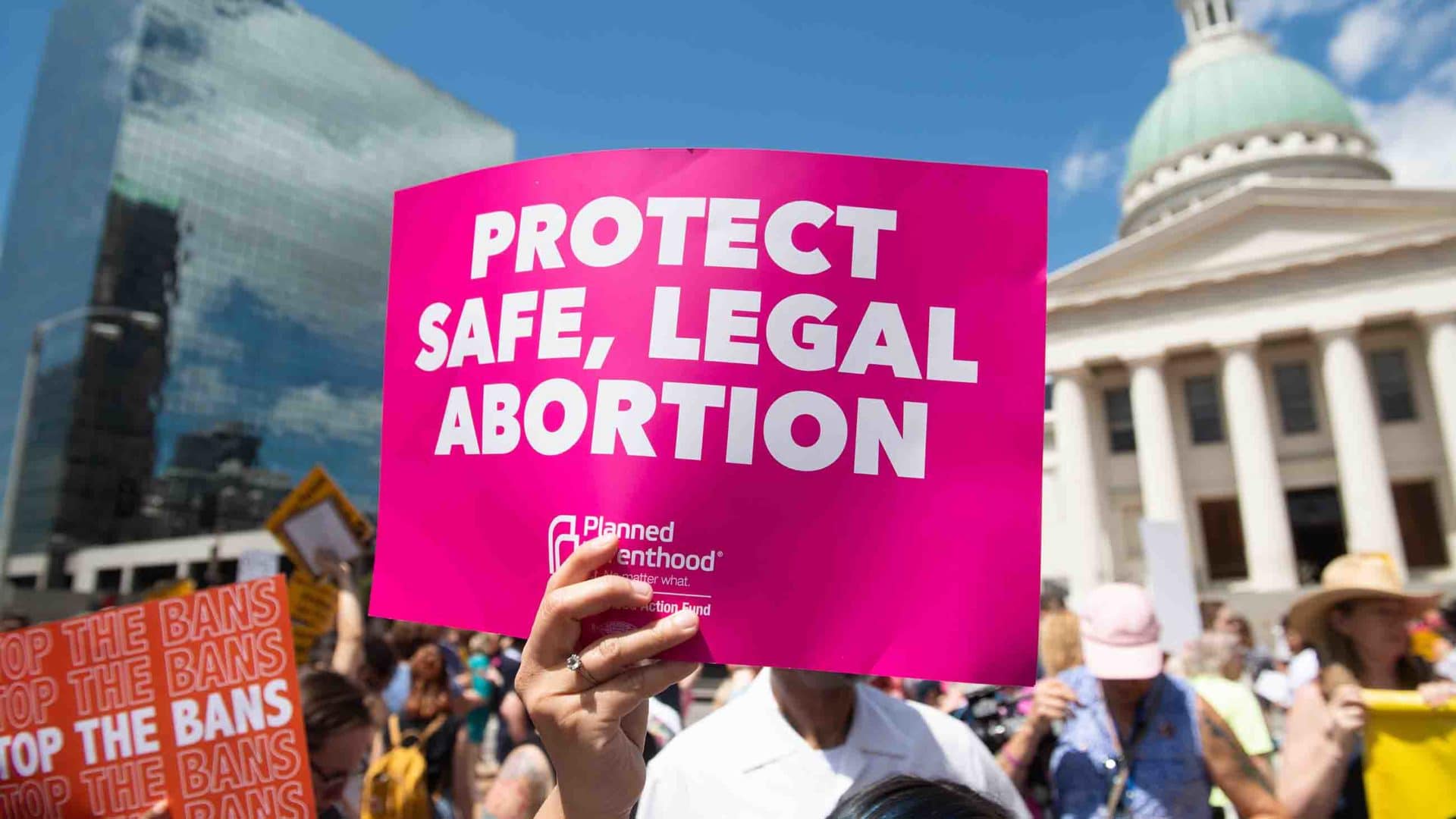 Protesters hold signs as they rally in support of Planned Parenthood and protest a state decision that would effectively halt abortions by revoking the center's license to perform the procedure, near the Old Courthouse in St. Louis, Missouri, May 30, 2019.