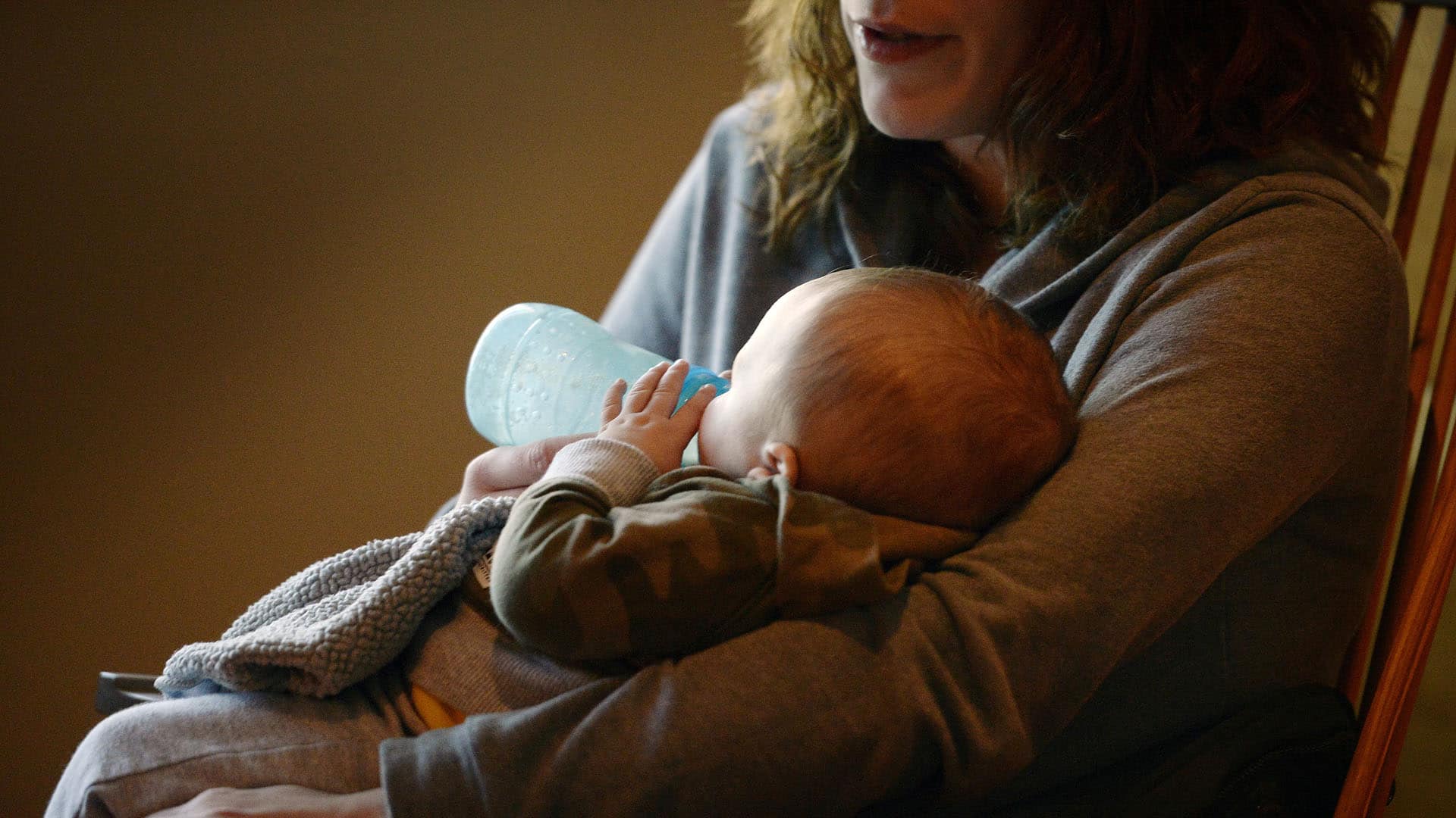 A mother feeds her four-month-old son, who was exposed to opiates in the womb, at the Woman's Pavilion of St. Mary's Hospital in Lewiston, Maine in 2016.