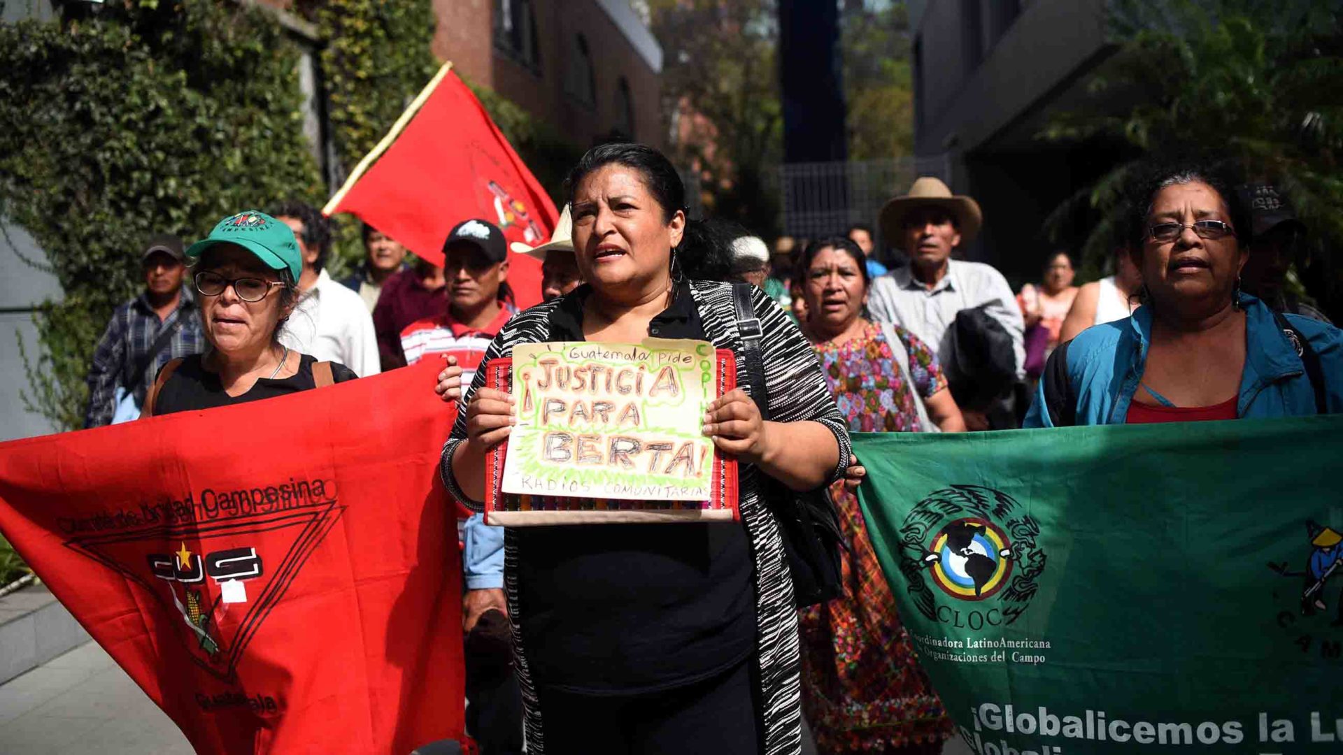 Peasant leaders and human rights activists protest the 2016 murder of Honduran environmental activist Berta Caceres.