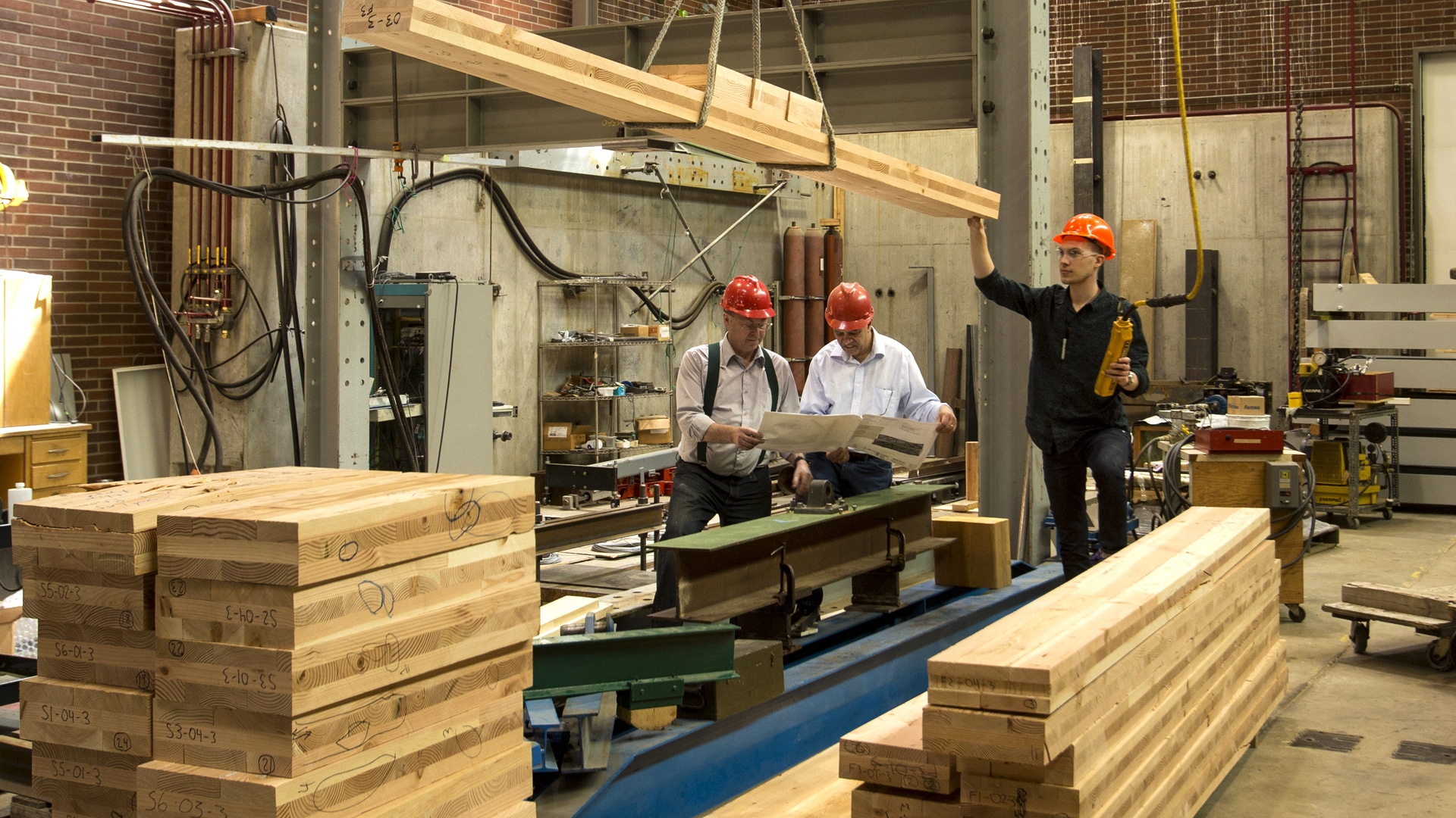 Researchers study cross-laminated timber in a laboratory at Oregon State University.