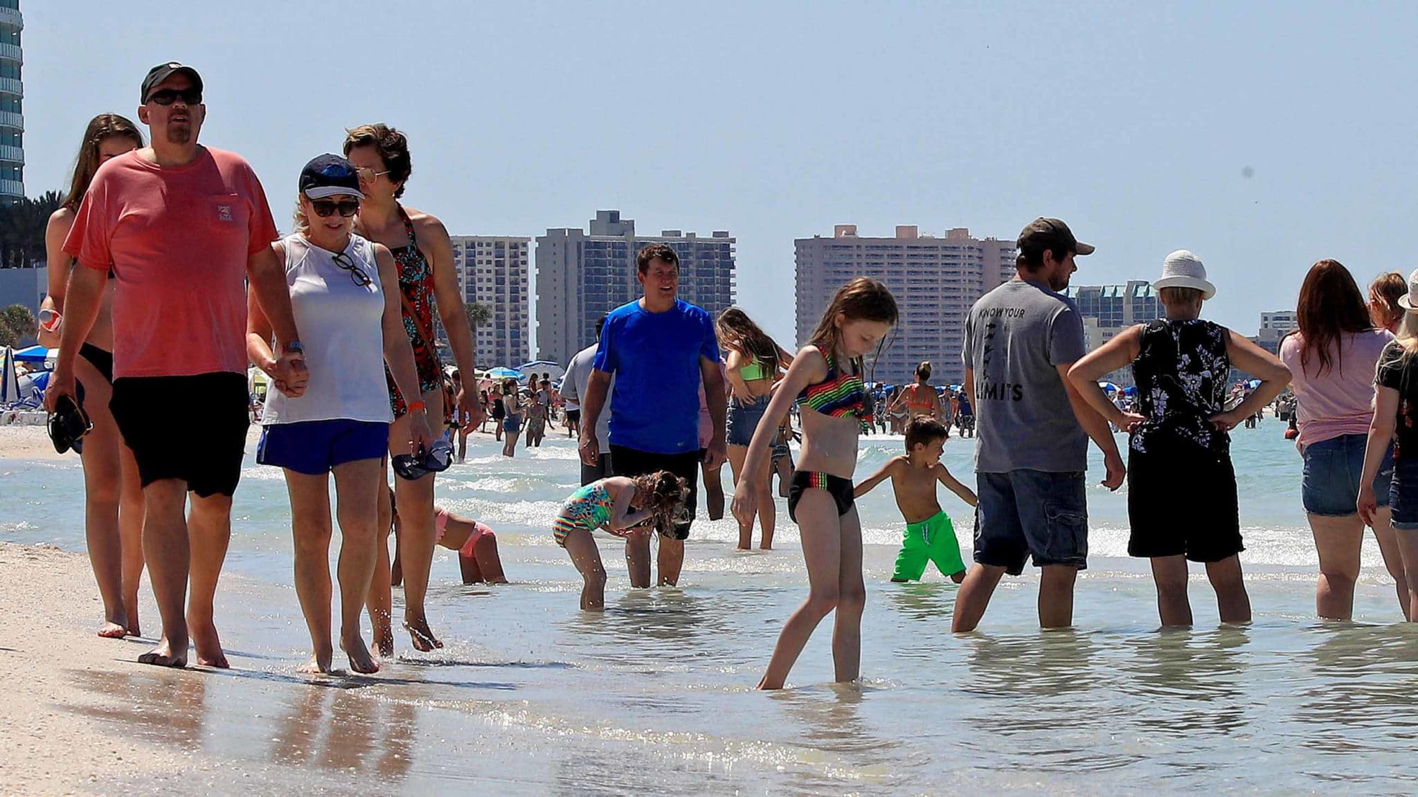 People gather on Florida's  Clearwater Beach last Wednesday.