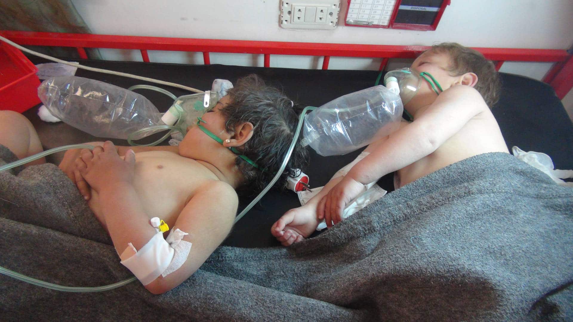 Children get treatment at a hospital after a chemical weapons attack on the village of Khan Sheikhoun, Syria, on April 4, 2017. Who was responsible for the attack remains a subject of heated debate.