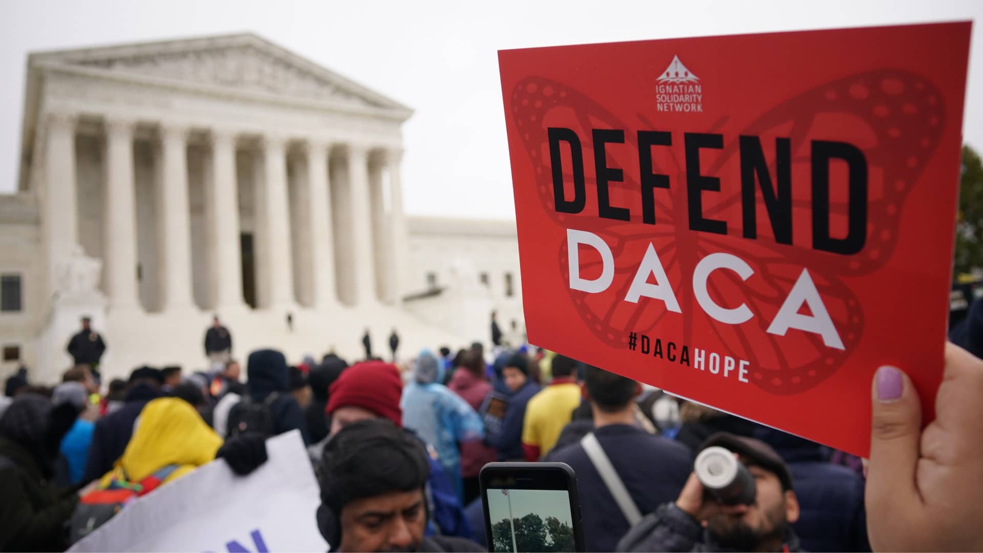 Immigration rights activists take part in a rally in front of the U.S. Supreme Court in Washington, DC on November 12, 2019.