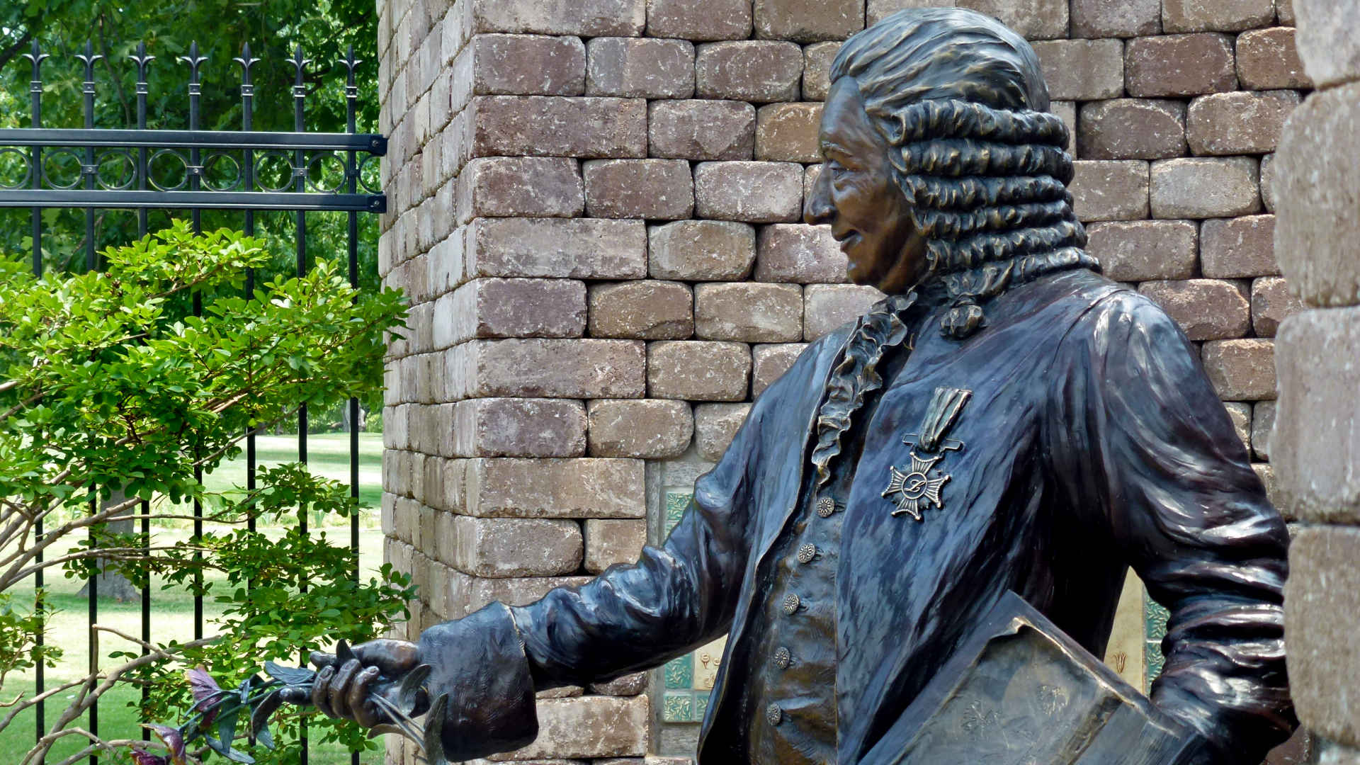 A statue of Carl Linnaeus in the Linnaeus Teaching Garden at Woodward Park, Tulsa, Oklahoma.