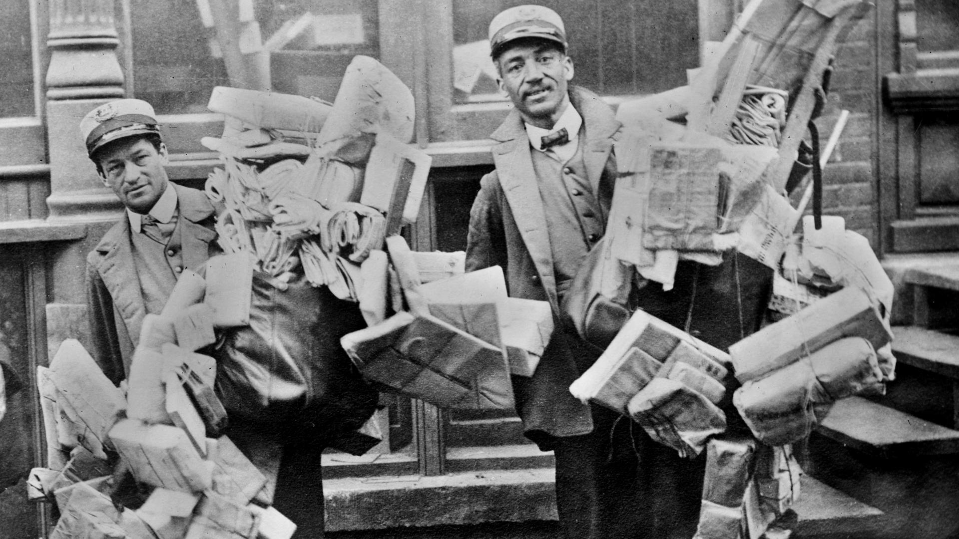 U.S. postal workers overrun with Christmas packages. With the introduction of steel rails in the 19th century, the commercialization of Christmas as a means to support the economy took hold.