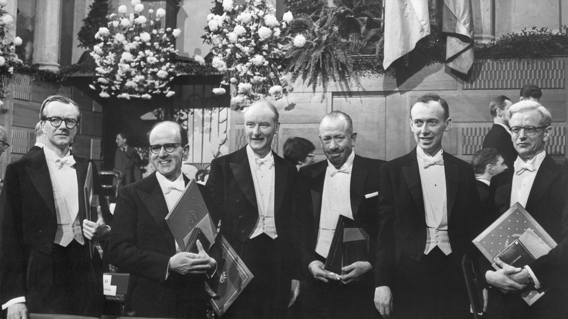The 1962 Nobel Prize winners, from left to right: Professor Maurice H. Wilkins (Medicine); Dr. Max Perutz (Chemistry); Dr. Francis Crick (Medicine); author John Steinbeck (literature); Prof. James D. Watson (Medicine); and Dr. John Kendrew (Chemistry).
