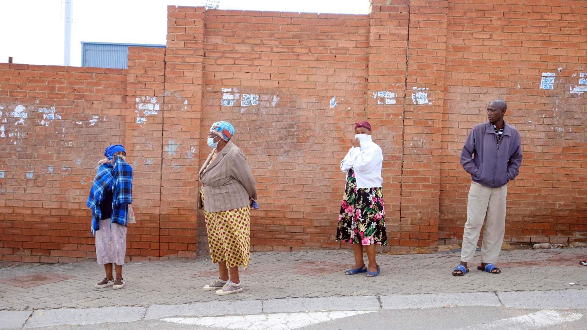 Residents wait in line for a Covid-19 test in Alexandra, South Africa.