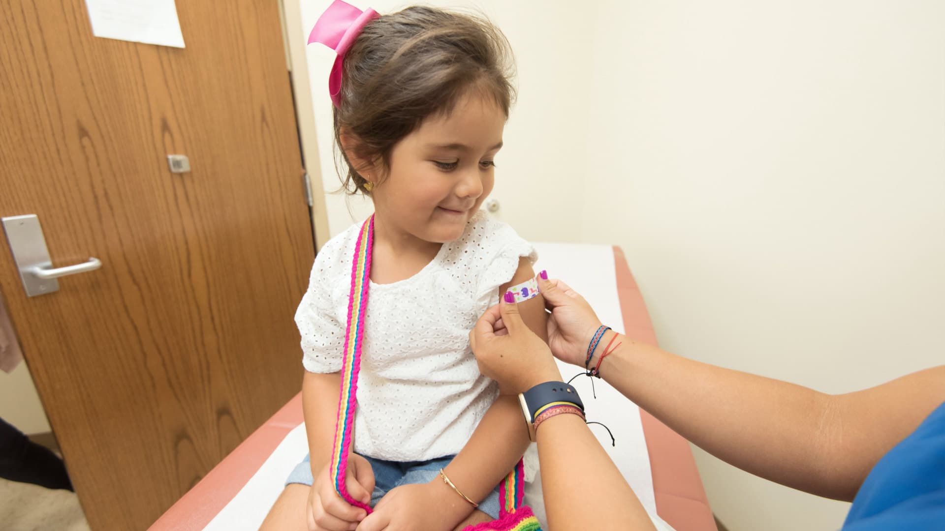 A child receives their seasonal influenza vaccine.