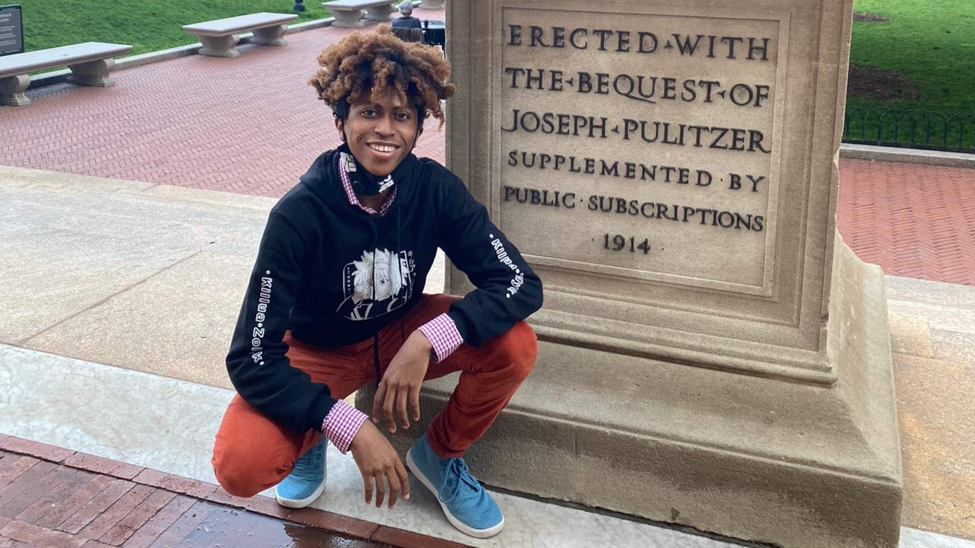 High school student Rainier Harris poses on the campus of Columbia University, which he will be attending in-person this fall.