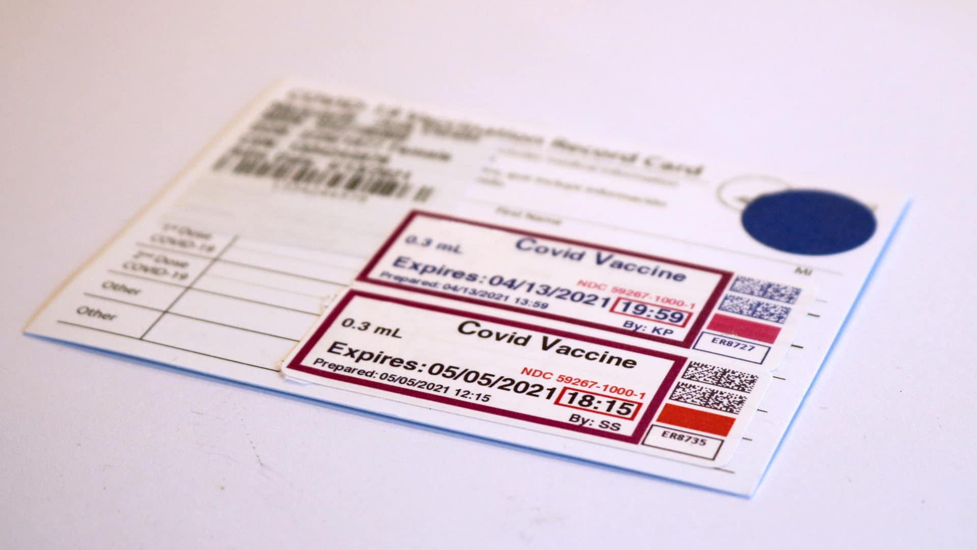 A Covid-19 vaccine record card.