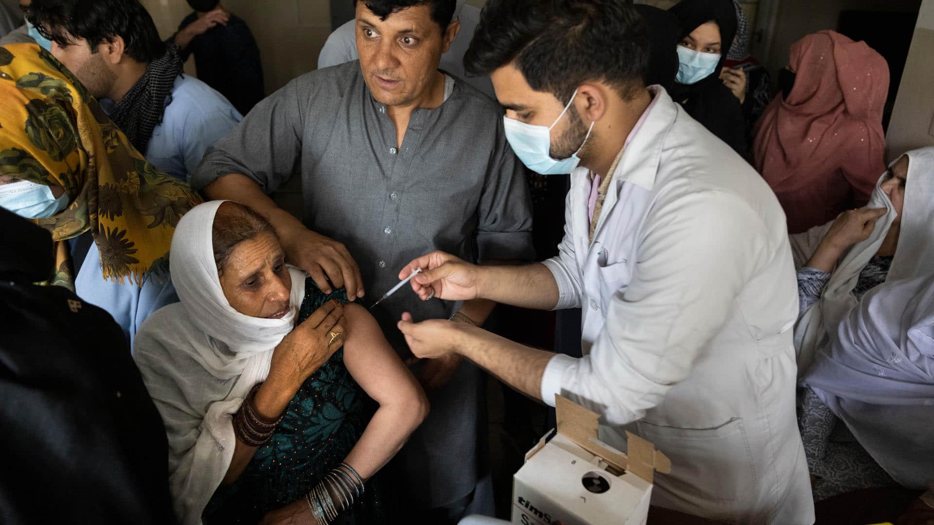 Doctors administer the J&J Covid-19 vaccine to Afghans at the Wazir Akbar Khan hospital in Kabul, Afghanistan in July.