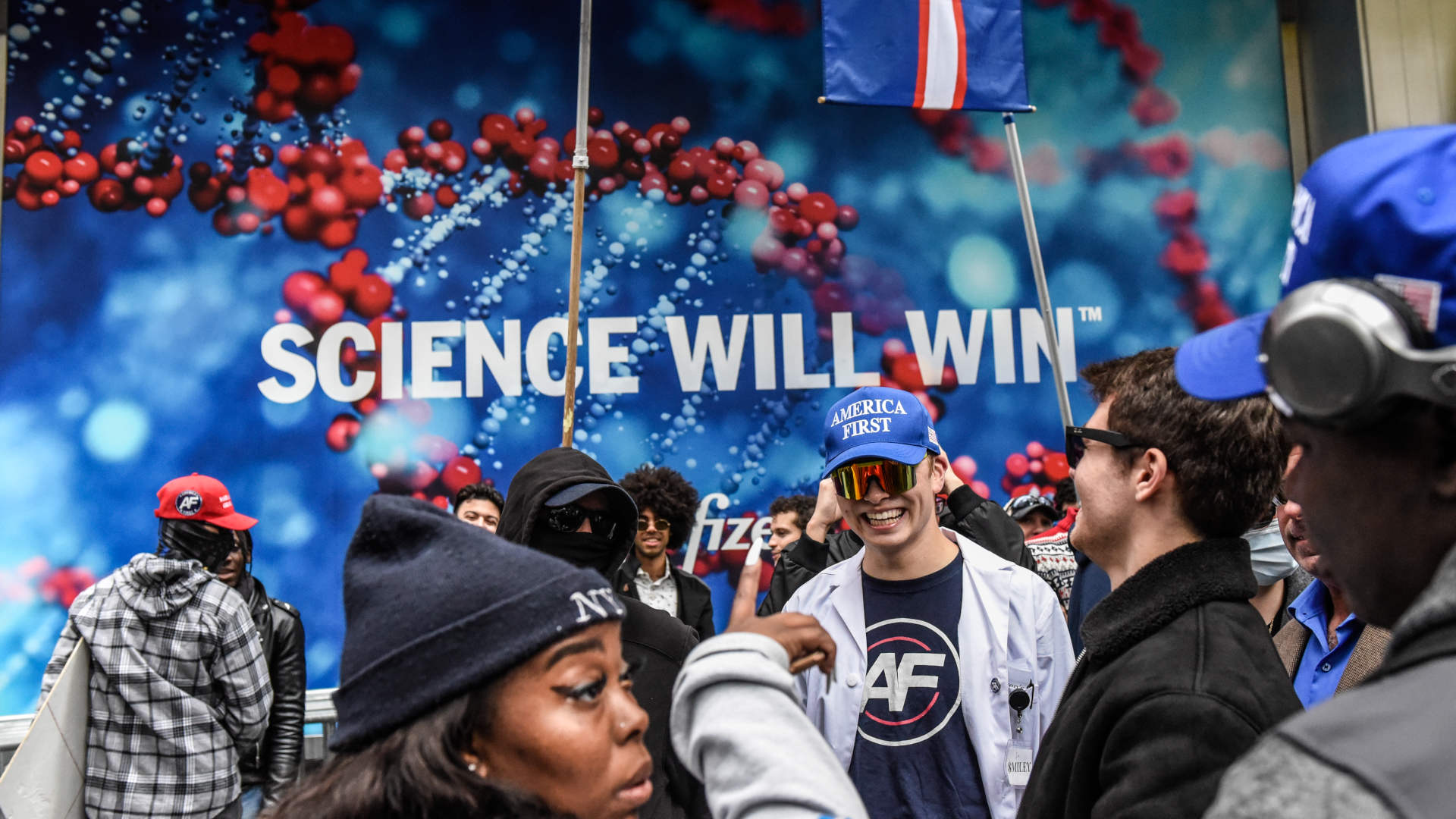 People associated with the far-right group America First attend an anti-vaccine protest in front of Pfizer world headquarters on November 13, 2021 in New York City.