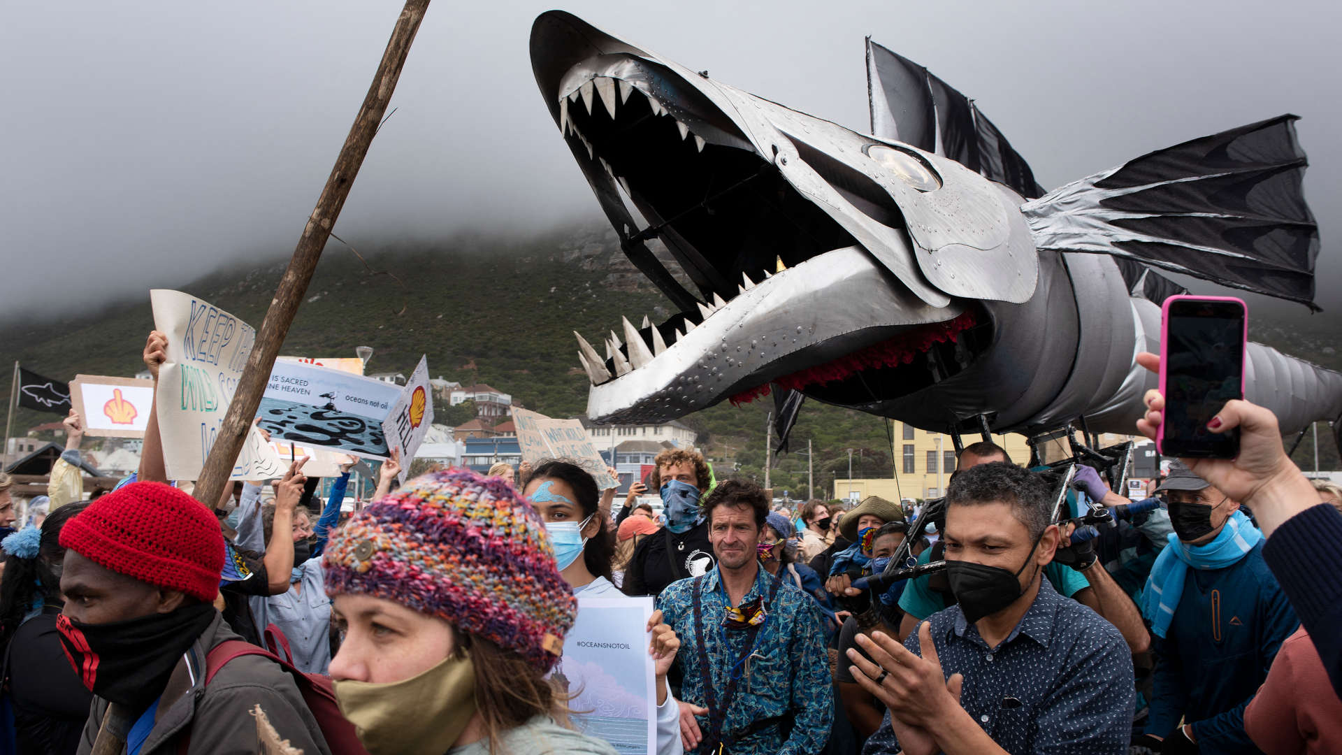 A giant puppet of a Snoek, a type of common local Mackeral, is displayed as hundreds of people take part in a December 2021 protest against Shell's plan to conduct underwater seismic surveys along South Africa's coast.