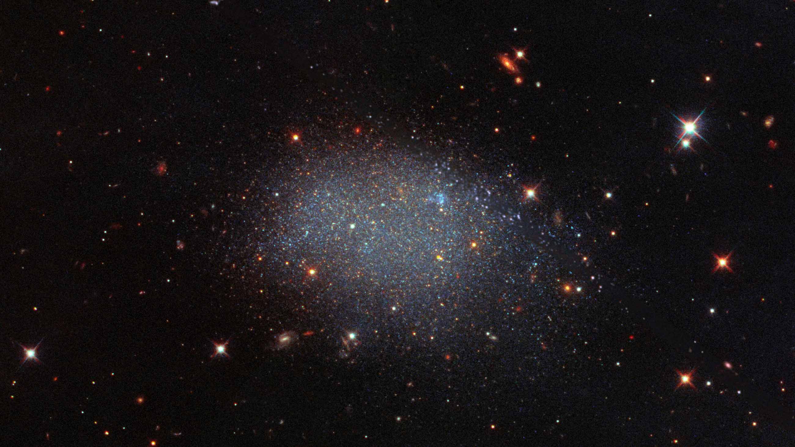 KK 246, also known as ESO 461-036, is a dwarf irregular galaxy residing within the Local Void, a vast region of empty space.
