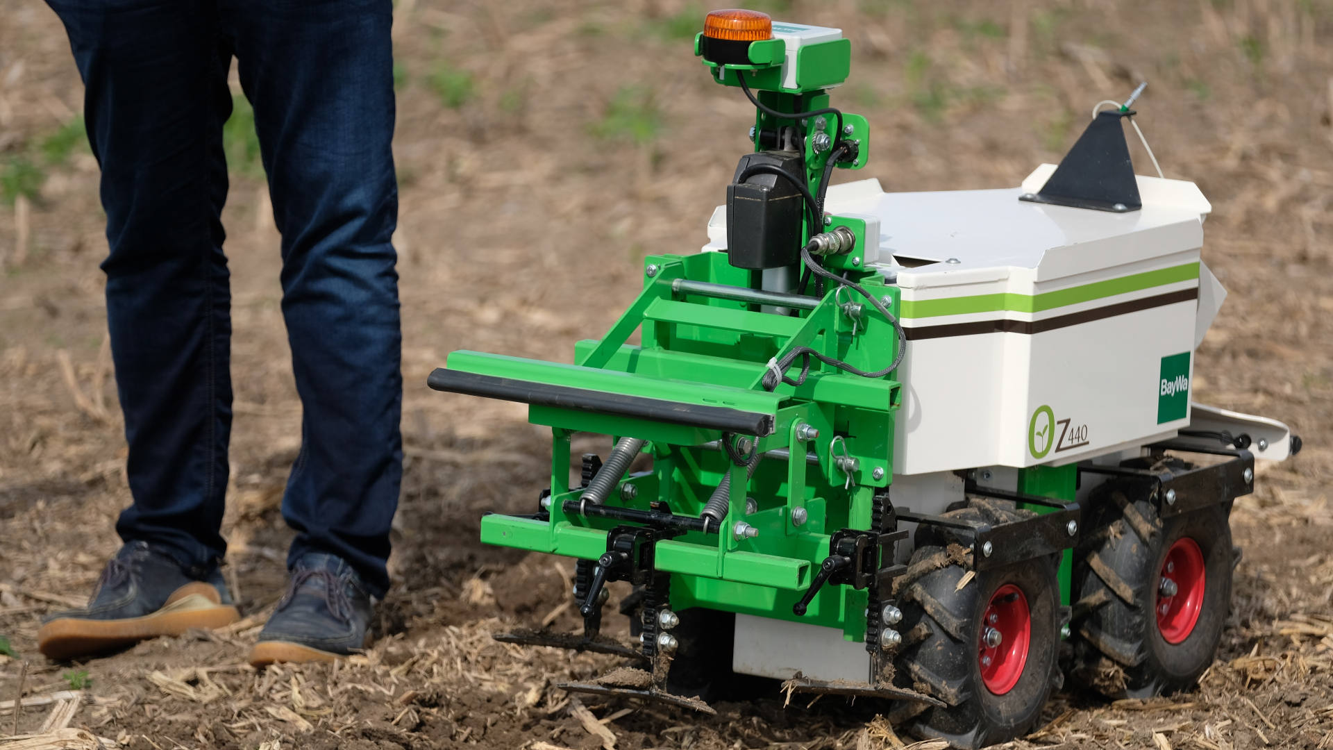The "OZ" field robot, which can independently work the soil or remove weeds, at a technology show in a field in northern Saxony, Germany.