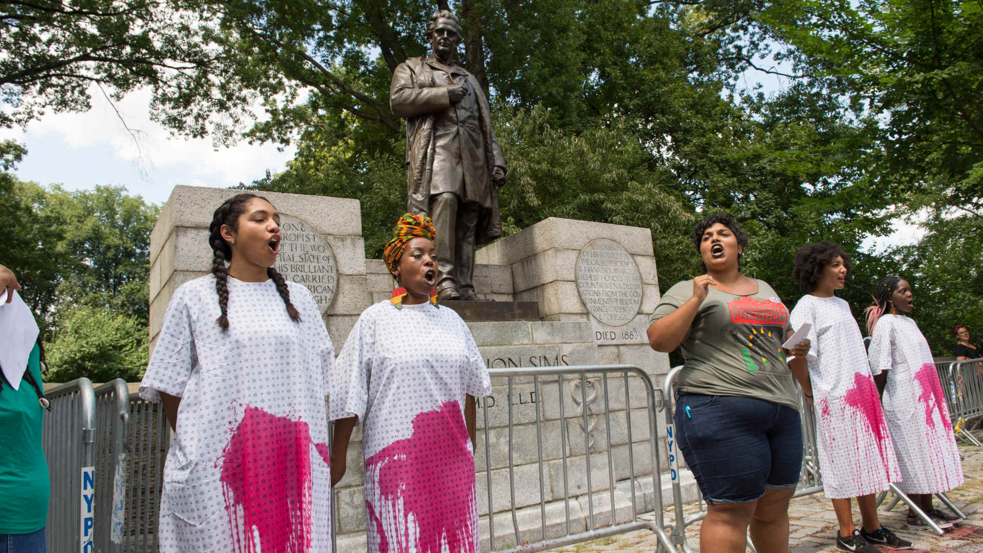 A rally advocating for the removal of statue of J. Marion Sims in Manhattan, New York, 2017.