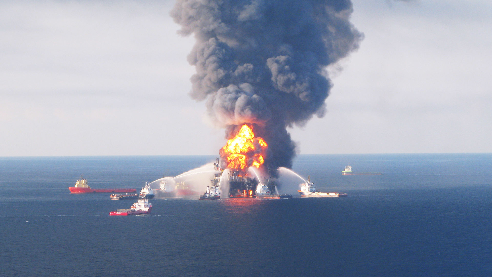 On April 21, 2010, crews battle a fire at the offshore oil rig Deepwater Horizon in the Gulf of Mexico.