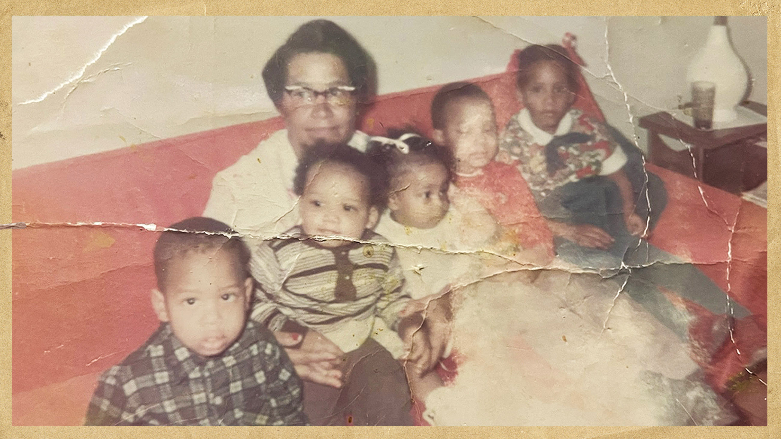 Ross Otto Hambrick, seen here sitting on his grandmother's lap alongside his three siblings and one cousin.