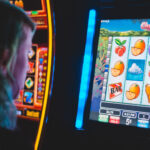 a person plays a slot machine