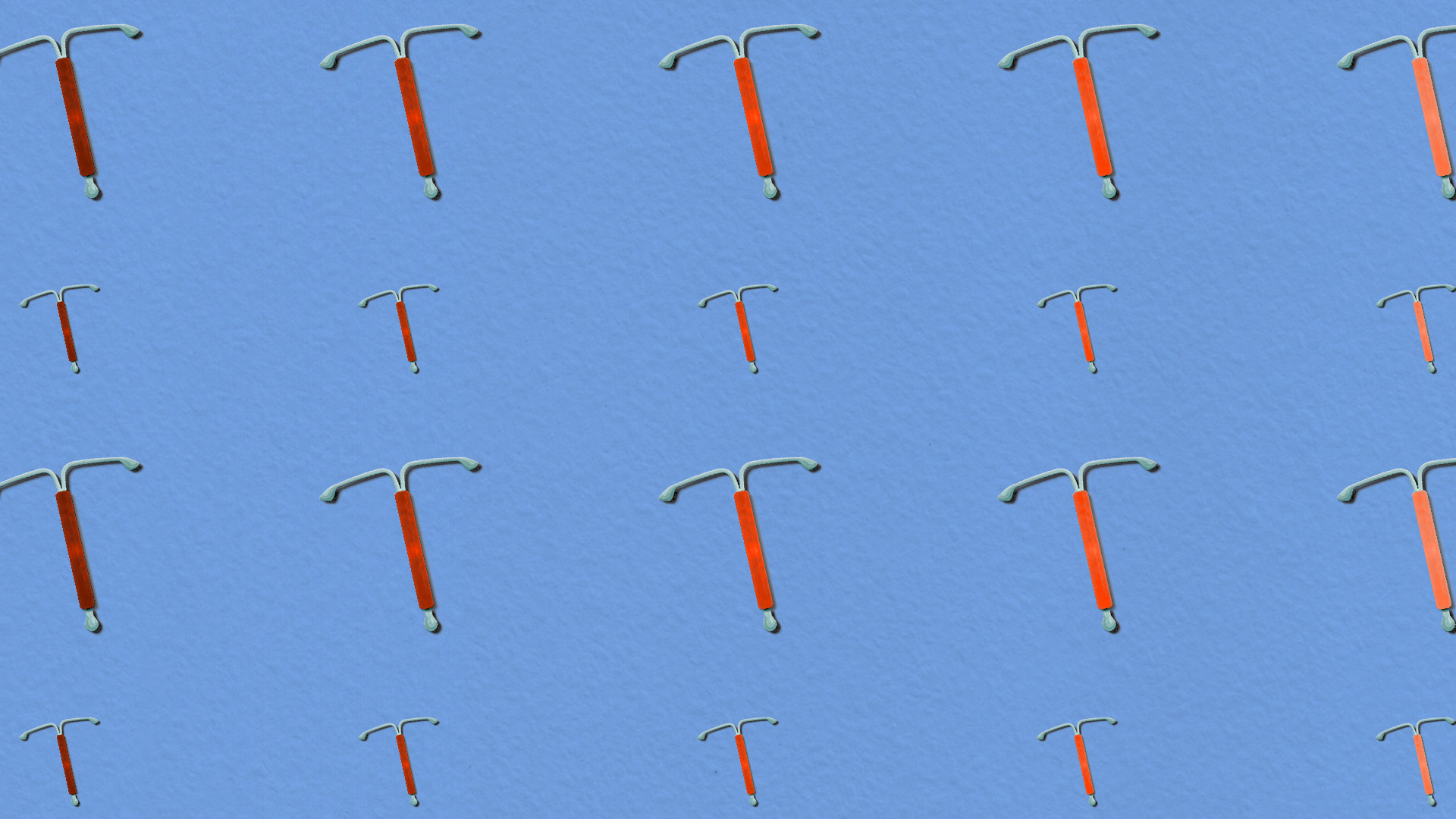 a grid of IUDs in different colors of red and orange