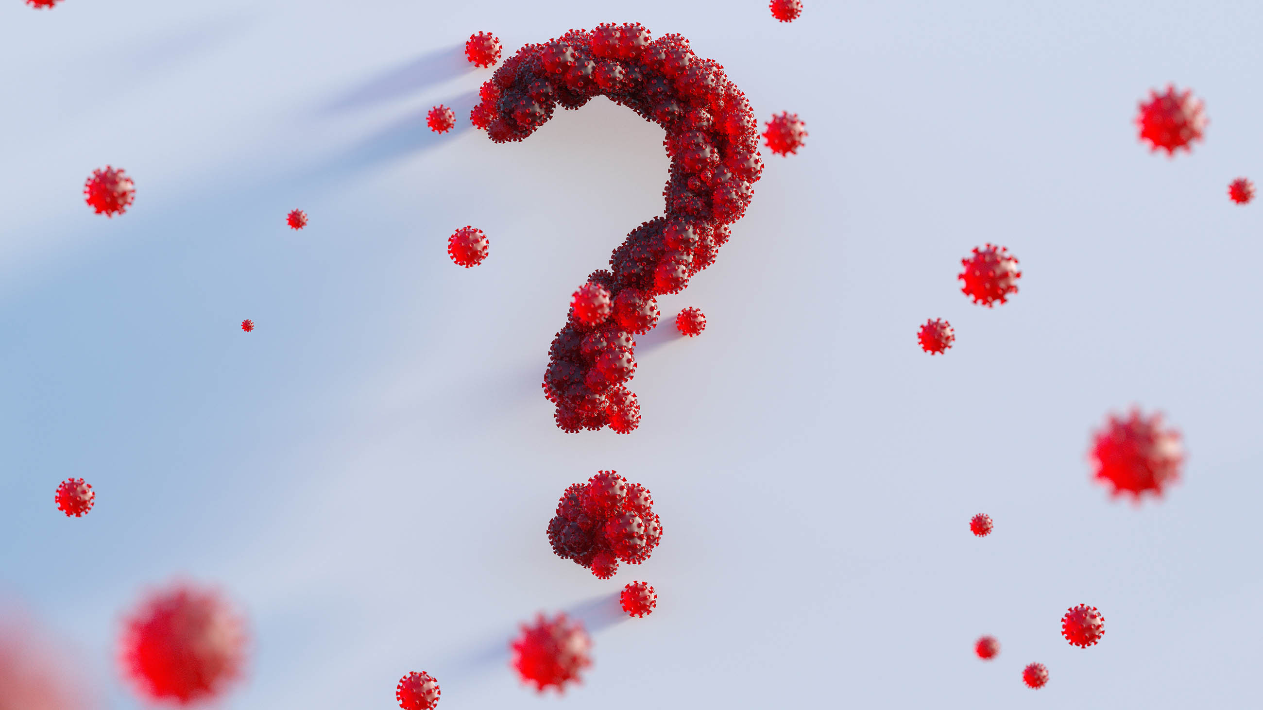 Digital generated image of semi transparent red Covid-19 cells connecting together and forming question mark against white background.