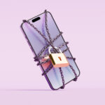 A smartphone, securely encased in a chain and locked with a sturdy padlock, reflects the tension between technology and security. This conceptual image symbolizes the growing concerns over digital privacy, the need for protection against cyber threats, and the potential dangers of constant connectivity. Ideal for marketing materials focused on cybersecurity, digital wellness, or the consequences of tech dependency, it offers ample space for your brand’s messaging or logo. The imagery evokes a sense of caution and the importance of securing one's digital life