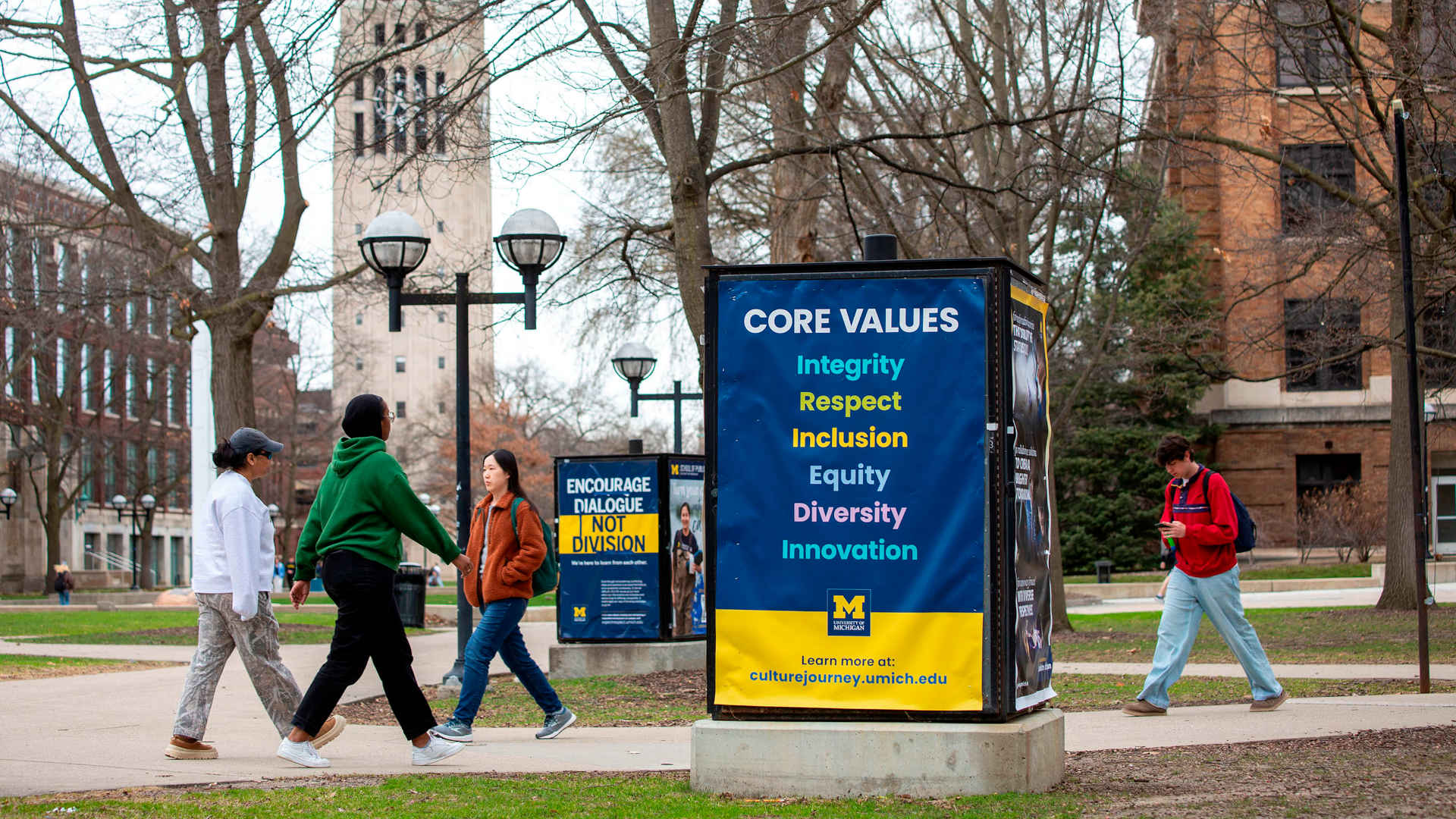 University of Michigan students walking on campus in early April.