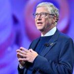 Bill Gates speaks with a