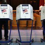 people voting at white polling stations