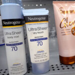bottles of sunscreen on a store shelf