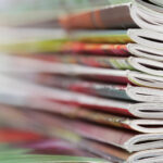 A stack of colorful magazines