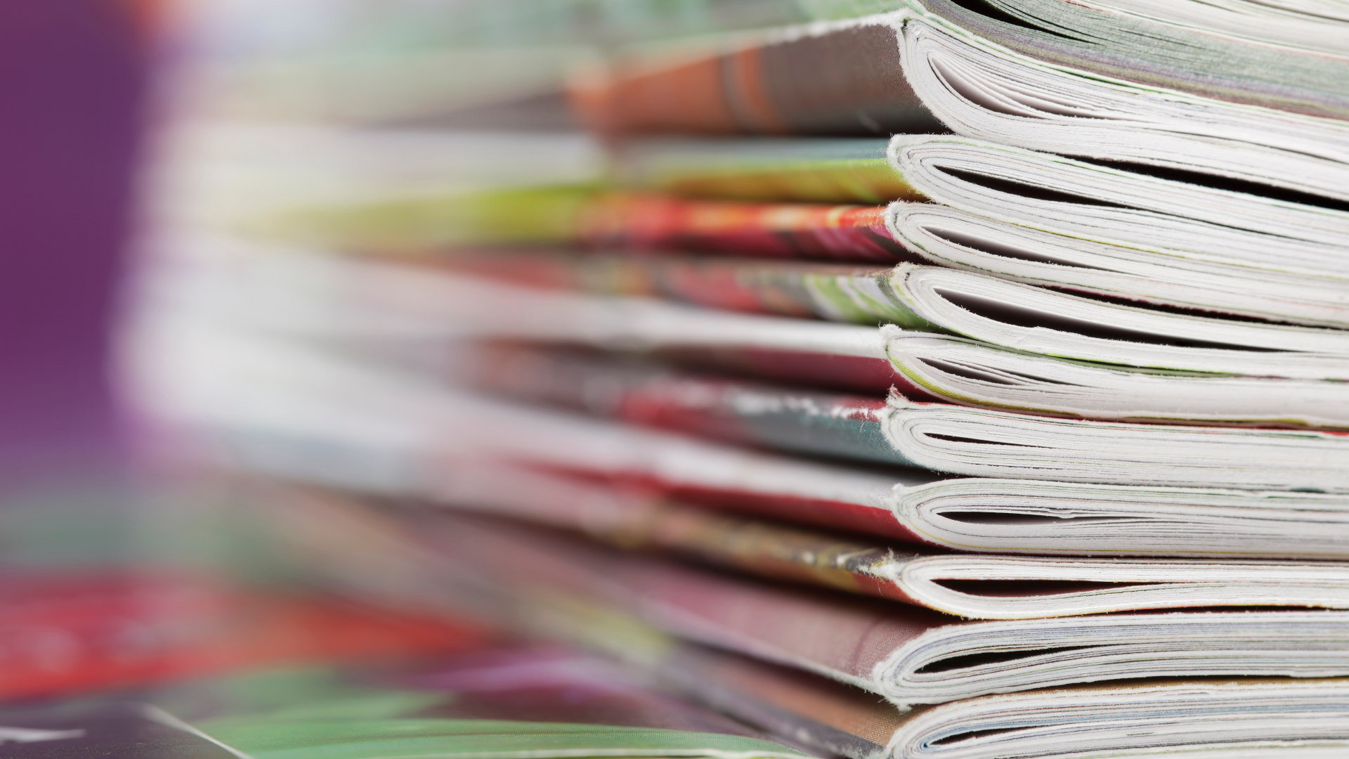 A stack of colorful magazines