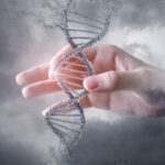 A hand encloses a strand of dna, with a background of clouds and small molecules