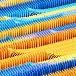 Digital generated image of multicolored dominoes falling over