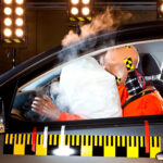 An airbag deploying during a crash test