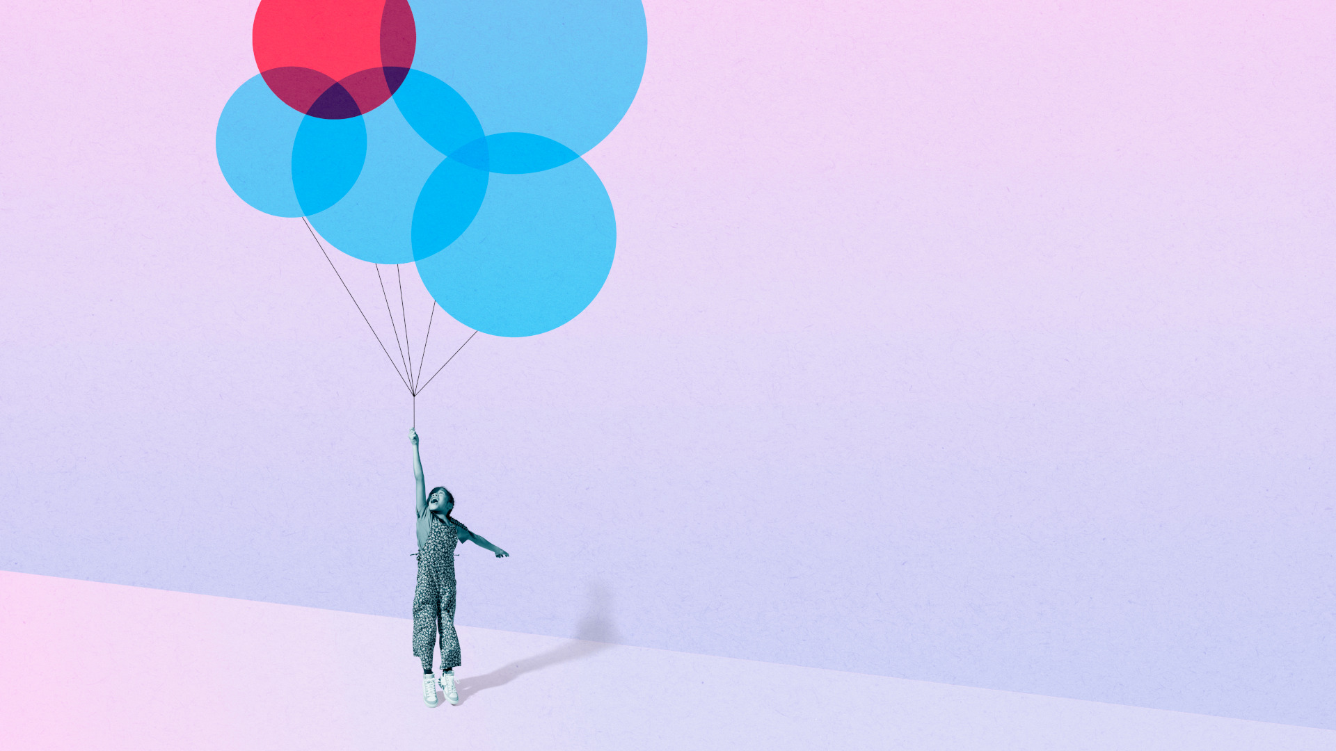 Girl flying with blue and red circle balloons against colored background